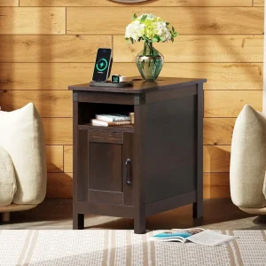 A narrow-sided table with a storage cabinet and charging station.